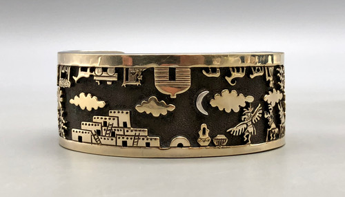 hefty, storyteller, 14K gold, gold overlay, stippling technique, textured and darkened, Herman Vandever