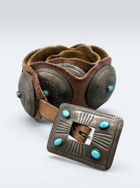 1940s, nine conchos, stamped line designs, brown leather belt, scalloped edges, Navajo