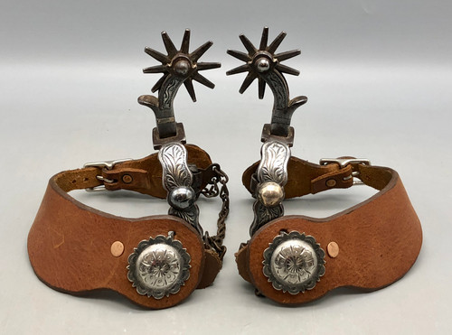 California style spurs, leather spur straps, single mounted spurs, engraved silver buttons, ten point rowels, antique