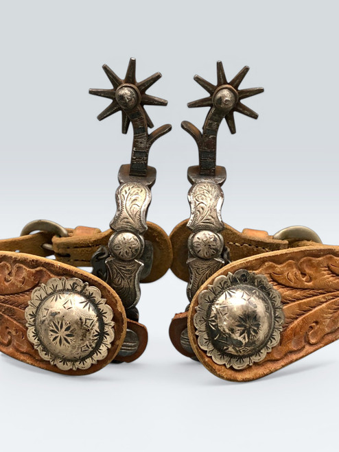 Antique, California style spurs, silver mountings, single mounted, engraved silver, engraved silver dot, eight point rowel, late 1800s to early 1900s