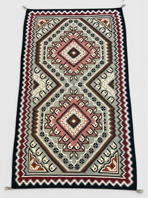 Finely woven, busy pattern, Navajo textile, muted palette, serrated edges, Native American, vintage