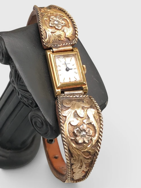 14 K gold and leather, Bohlin, letterhead and catalogs, Bud Phillips, diamonds, emeralds,  Wittnauer watch,  vintage