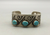 Vintage, Geometric cuff  with three beautiful turquoise stones.