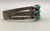 Beautiful cuff with dot dash pattern with natural turquoise stones.
