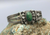 A hand made Fred Harvey era cuff, with green turquoise stone.