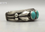 Seven turquoise stone cuff, hand stamped
