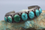 Seven turquoise stone cuff, hand stamped