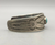A Fred Harvey era cuff, with two turquoise cabochons and fluted silver drop.