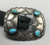 Concho belt with oval conchos with small turquoise stones.