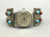Vintage watch with coral and turquoise.