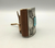 Coolidge Nez Ketoh or Bowguard brown leather and turquoise