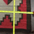 Ganado style rug with red, brown, creams.