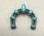 Turquoise naja pendant bu Nick Jackson