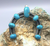 Turquoise naja pendant bu Nick Jackson