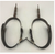 Kelly Bros spurs with heart shape buttons and black leather spur straps.marked Kelly Bros. and the other marked Kelly Bros & Parker (written out).