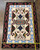 Navajo textile from the Teec Nos Pas area, weaver