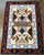 Navajo textile from the Teec Nos Pas area, weaver