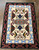 Navajo textile from the Teec Nos Pas area, weaver