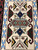 Navajo textile from the Teec Nos Pas area, weaver