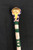 beaded "skull cracker", rawhide, horsehair tassel, stone wrapped