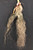 beaded "skull cracker", rawhide, horsehair tassel, stone wrapped