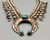 3-stone sandcast naja squash blossom necklace, turquoise cabochons, coated wire