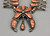 Zuni peach coral inlay and sterling silver squash blossom necklace, two strands of sterling silver beads, foxtail wire