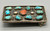 vintage turquoise and coral belt buckle, dot accents and a twisted wire trim, good weighted feel