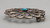 sandcast and turquoise belt buckle, flower or wave like design, turquoise cabochon