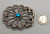 sandcast and turquoise belt buckle, flower or wave like design, turquoise cabochon