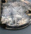 eagle themed bolo and belt buckle set, highly detailed features such as carved feathers, claws, leaves and wooden branch, hand stamped designs