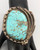 vintage turquoise and sterling silver bracelet, grand turquoise cabochon in a handmade sawtooth bezel, four wire terminal