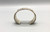 sterling silver and gold bracelet by award winning artist Edison Cummings, conjoining X like fashion with brushed background for texture