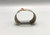 sterling silver, gold, and coral bracelet by award winning artist Edison Cummings, coral tear drop shaped cabochon in a gold bezel