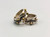his and hers sterling silver and gold rings by award winning artist Edison Cummings, geometric design with a darkened silver background, 14K yellow gold