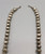 vintage Navajo pearl necklace, graduating sizes, conjoined by silver findings and strung on a link chain