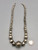 vintage Navajo pearl necklace, graduating sizes, conjoined by silver findings and strung on a link chain