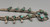 unique squash blossom necklace set with a matching ring, great turquoise nugget cabochons throughout the naja and blossoms, silver applique