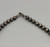 vintage squash blossom necklace, classic naja style with eight beautiful green turquoise cabochons, sterling silver and strung on a coated wire