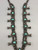 vintage squash blossom necklace, classic naja style with eight beautiful green turquoise cabochons, sterling silver and strung on a coated wire