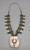 vintage box bow squash blossom necklace, 13 turquoise cabochons that are all accented with hand stamped designs, foxtail wire