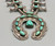 vintage box bow squash blossom necklace, 13 turquoise cabochons that are all accented with hand stamped designs, foxtail wire