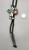 bird dancer inlay bolo tie, turquoise, mother of pearl, onyx, and coral, black leather cord