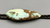 pale green turquoise bolo tie, large, oval shaped, pale green turquoise stone setting in a silver backing with "claw" holders