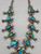 turquoise and sterling silver squash blossom necklace, leaf applique, loops, dots of silver, twisted wire, foxtail wire