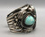hefty three-stone turquoise bracelet, thin twisted wire along the edges, detailed applique, six wire terminal
