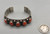 hefty five-piece coral bracelet, twisted wire accents, darkened silver effect with silver dot accents