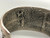 tufa cast and cobblestone inlay bracelet by Navajo artist, Harrison Jim, cobblestone inlay of wood, turquoise, onyx, and coral, geometric designs