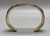 sterling and cobblestone inlay bracelet by Navajo artist, Harrison Jim, cobblestone inlay of turquoise and coral, brushed background