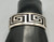 sterling silver overlay bracelet by Hopi artist, Bernard Dawahoya, geometric overlay design, tippling technique, darkened silver background